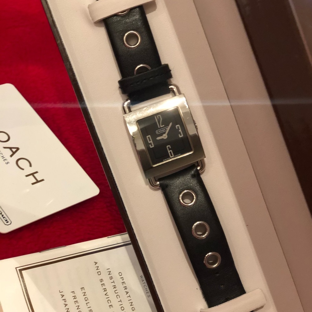 Black and silver Coach leather strap wrist watch